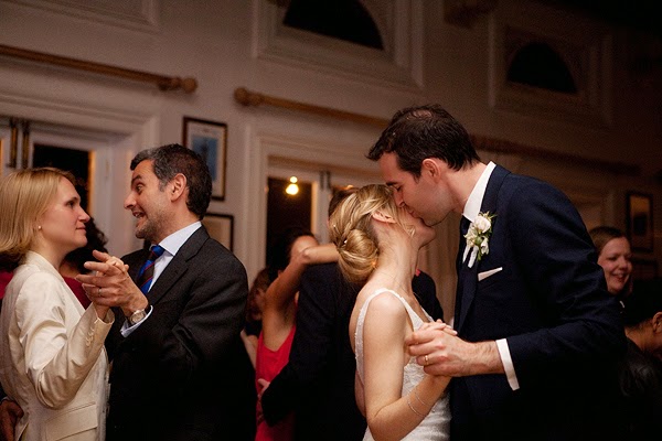 Wedding at London Rowing Club on the Thames. Bride and groom first dance