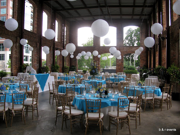 The linens were ivory with turquoise satin overlays and gold chivari chairs