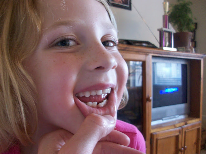 Laurie lost her 1st tooth