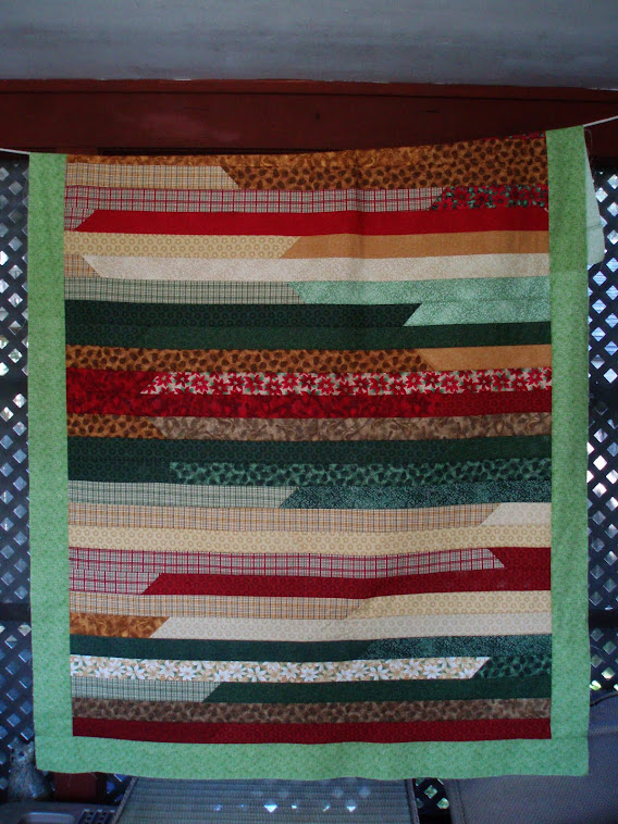 Xmas Jelly Roll Quilt(after)