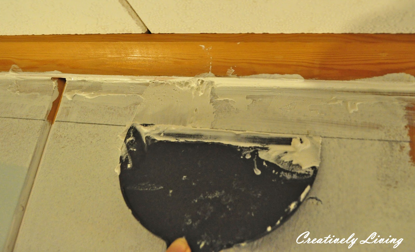 Creatively Living Faux Molding and Painting for Wood Paneling (under