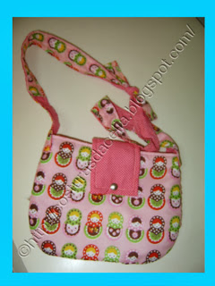 <Img alt =mala para menina rosa com tecido com pradão de matriosca <Img alt =mala de menina para traçar
