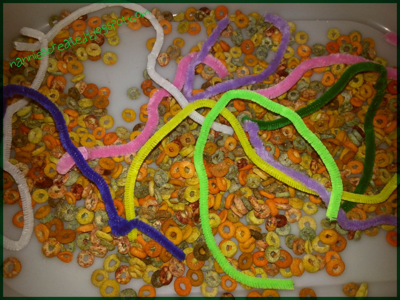 Nannies Created Coloured Cheerios and Pipe cleaners