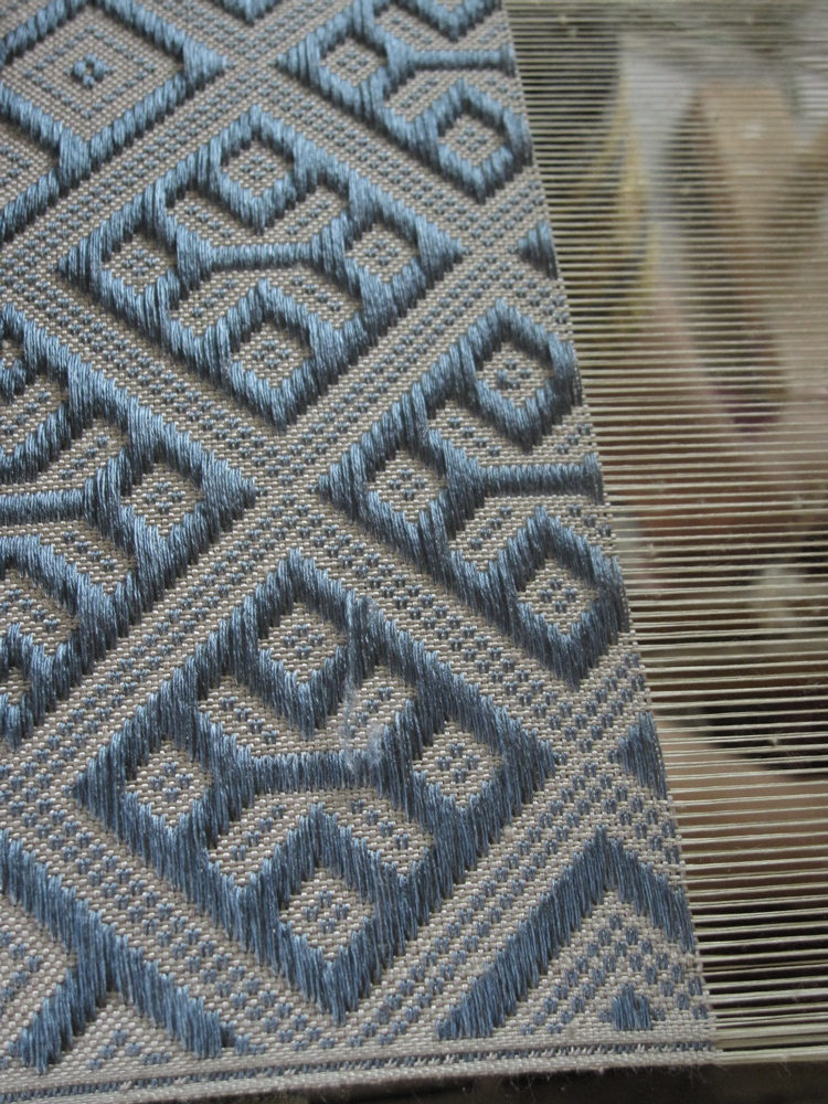 eine Saite Lao supplementary weft weaving