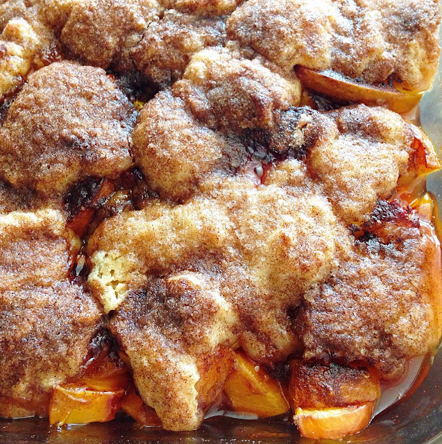 Southern Peach Cobbler with a flaky, buttery, cinnamon sugar crust! get the recipe at barefeetinthekitchen.com Southern Peach Cobbler with a flaky, buttery, cinnamon sugar crust! get the recipe at barefeetinthekitchen.com