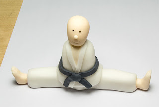 Karate fighter fondant figurine feet on legs