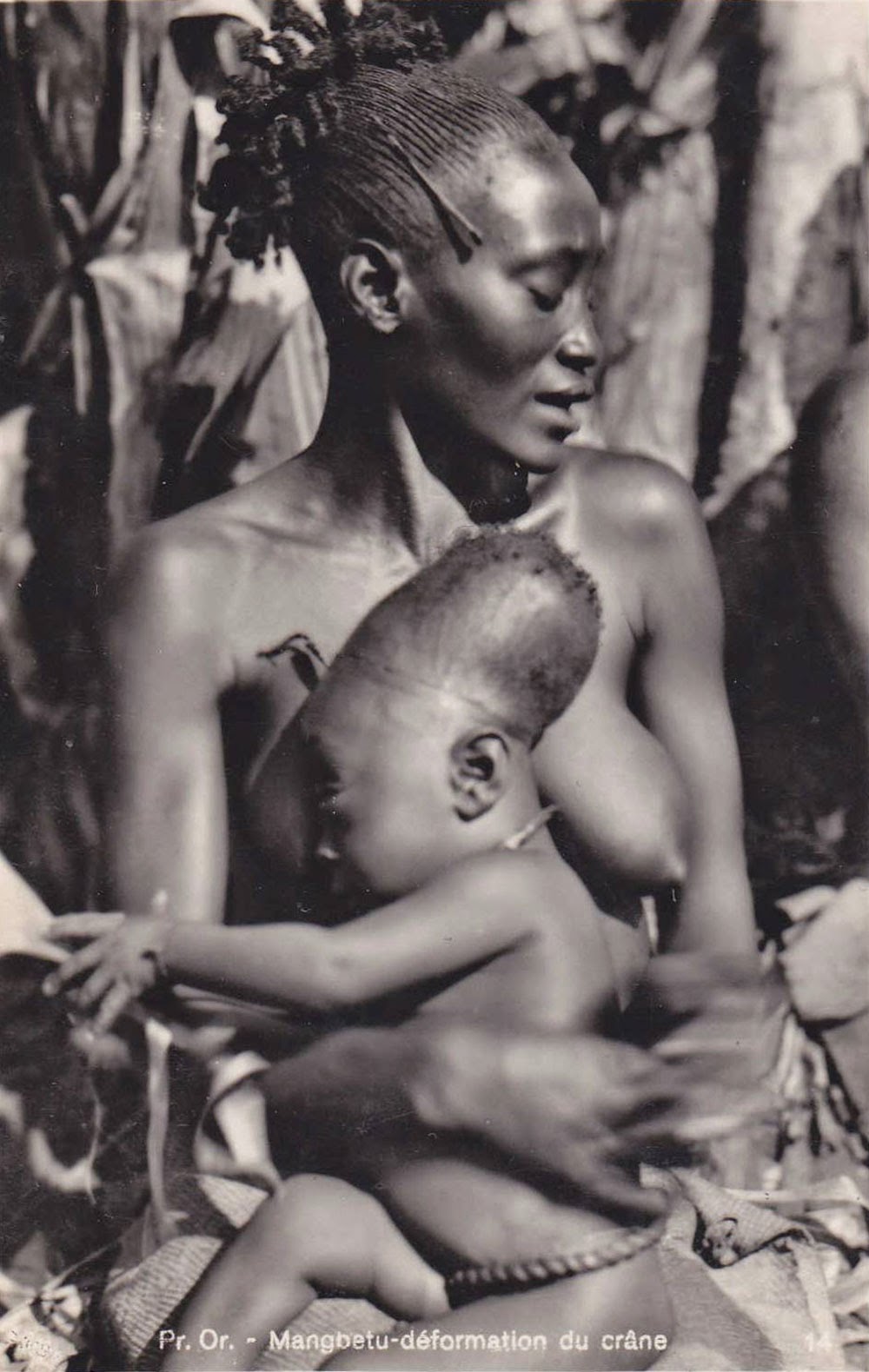 A Mangbetu woman and her child.