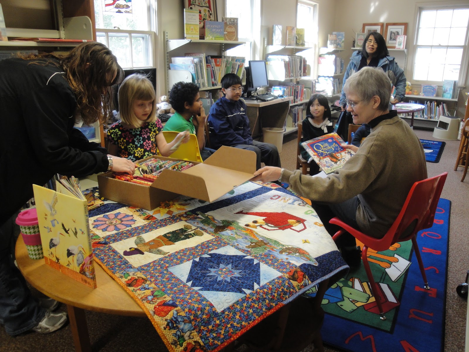 WHAT'S HAPPENING! March 31st STORY TIME THE QUILTMAKER'S GIFT