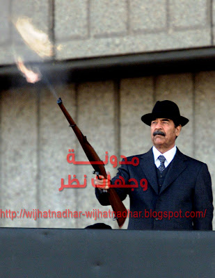 ألبوم صور الرئيس الشهيد صدام حسين النادرة، Photo+of+then+Iraqi+president+Saddam+Hussein+firing+shots+into+the+air+in+Baghdad+copy