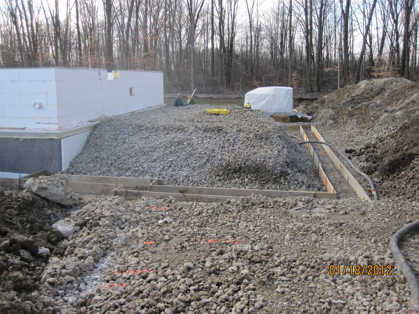 Energy Efficient Building Network Placing Concrete In Garage Footings