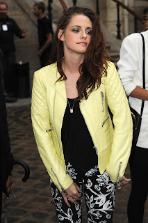 Kristen Stewart floral print pants a nd yellowo leather jacket