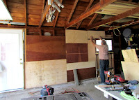 Starting to clean up the garage and use some of the panels we took out of the house