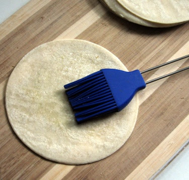 making homemade tortilla chips
