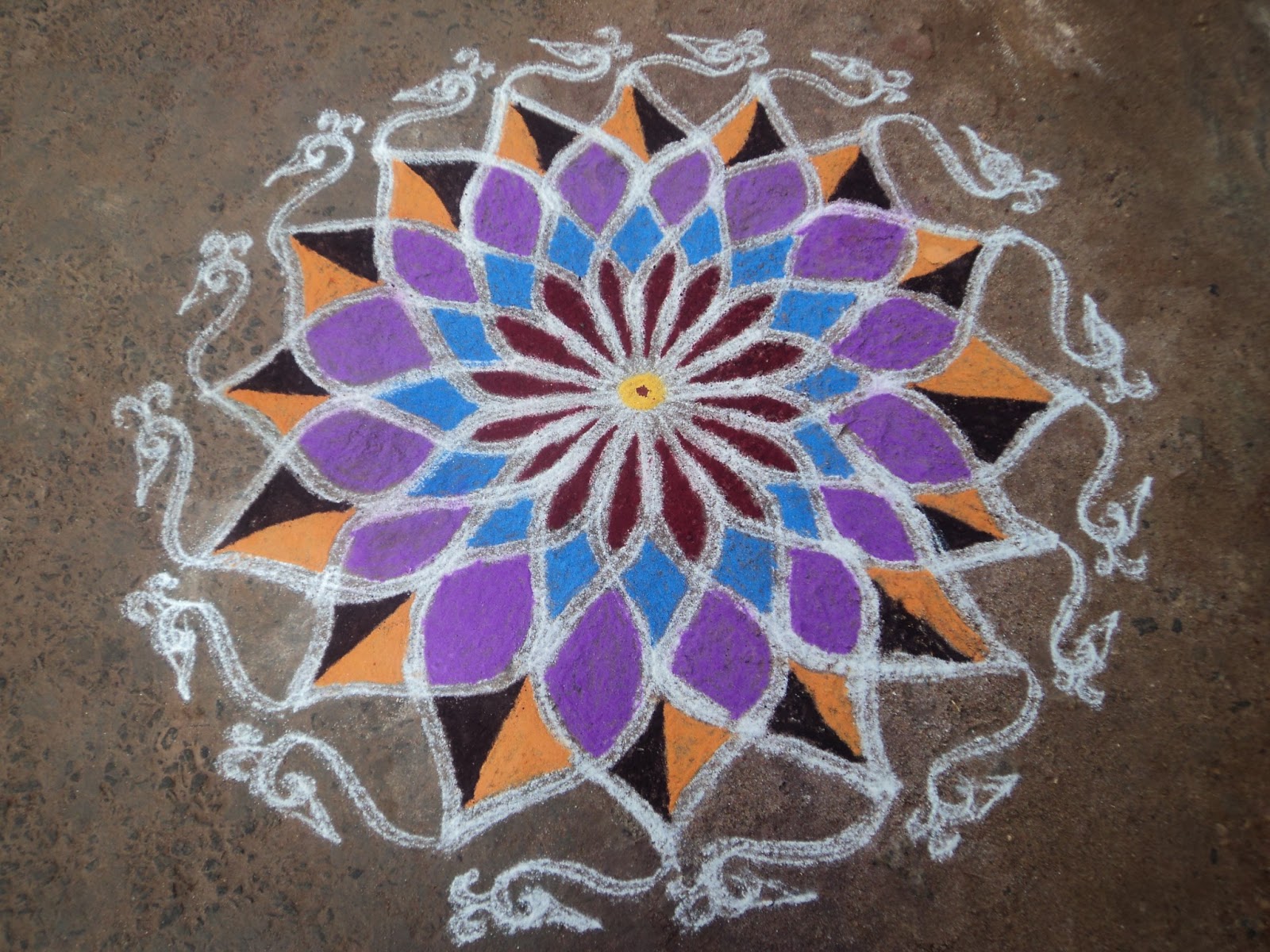Beautiful Kolam and Painting Rangoli Kolam