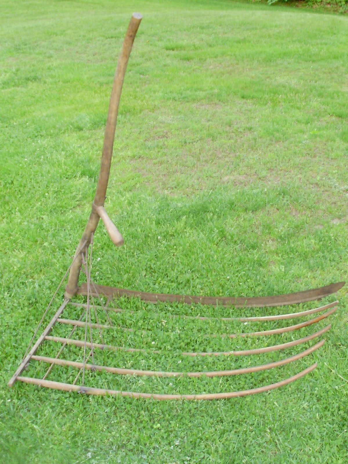 Log Cabin Antiques & Gifts Grain cradle or grain scythe