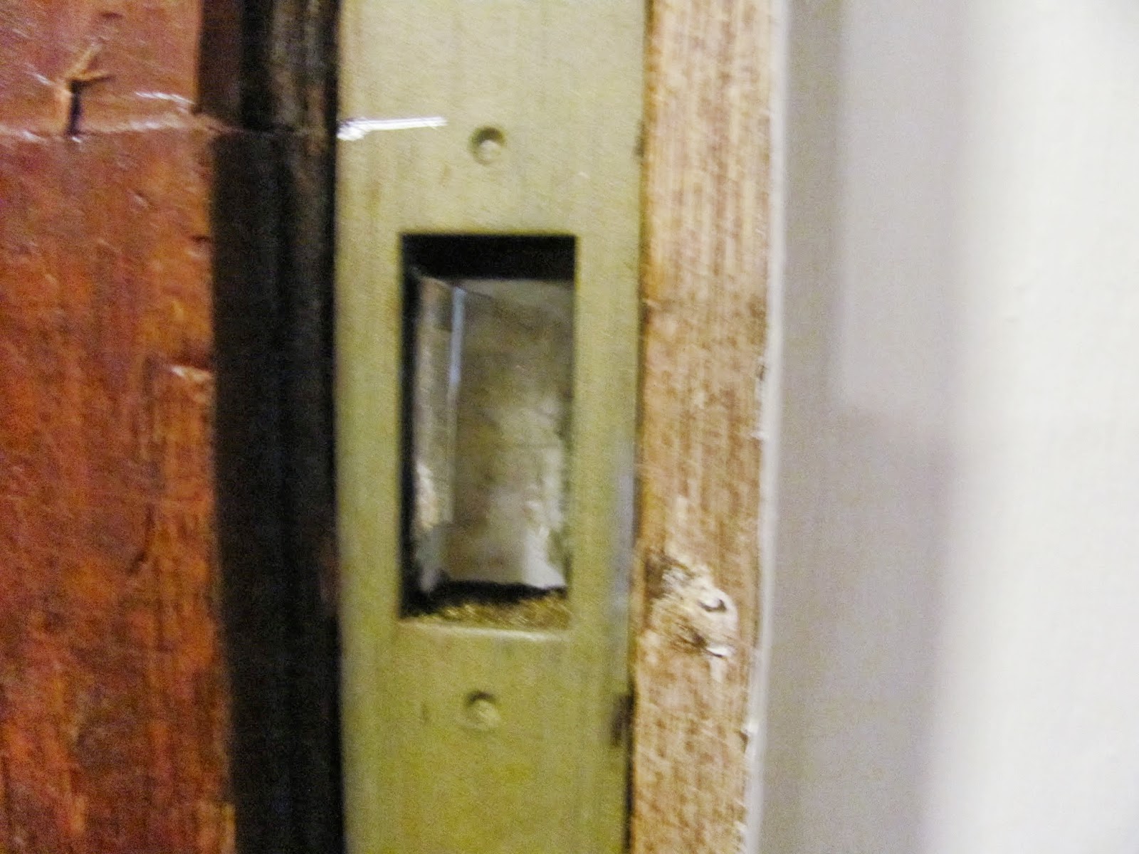 Stuffing the Socket Paper is used to pad the dead-bolt socket on the door