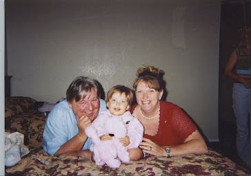 A YOUNG BRIAN AND GILLY WITH THEIR GRAND-DAUGHTER BETHAN TAKEN SEVERAL YEARS AGO.