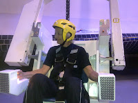 73-yr-old Gloria on SpaceLand's Space Shuttle MMU test.jpg