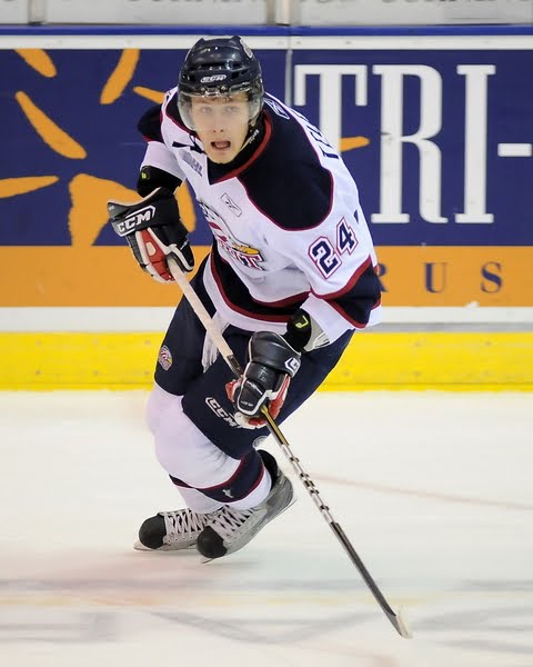 Danny Vanderwiel of the Plymouth Whalers moves the puck against