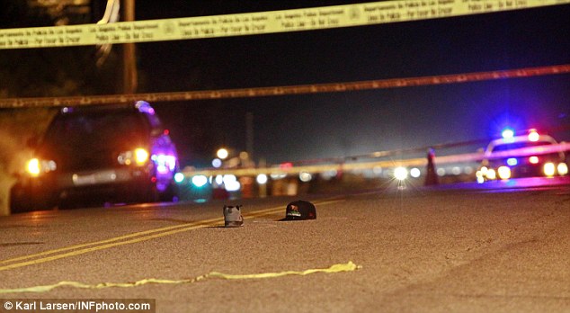 This picture shows the photographer's hat and shoe lying in the road where he was hit