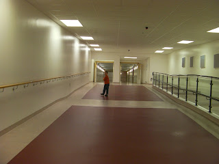 connecting corridor inside giant hospital