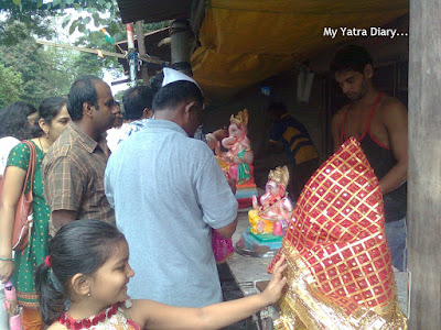 People purchasing Ganpati idols during Ganesh Chaturthi festival
