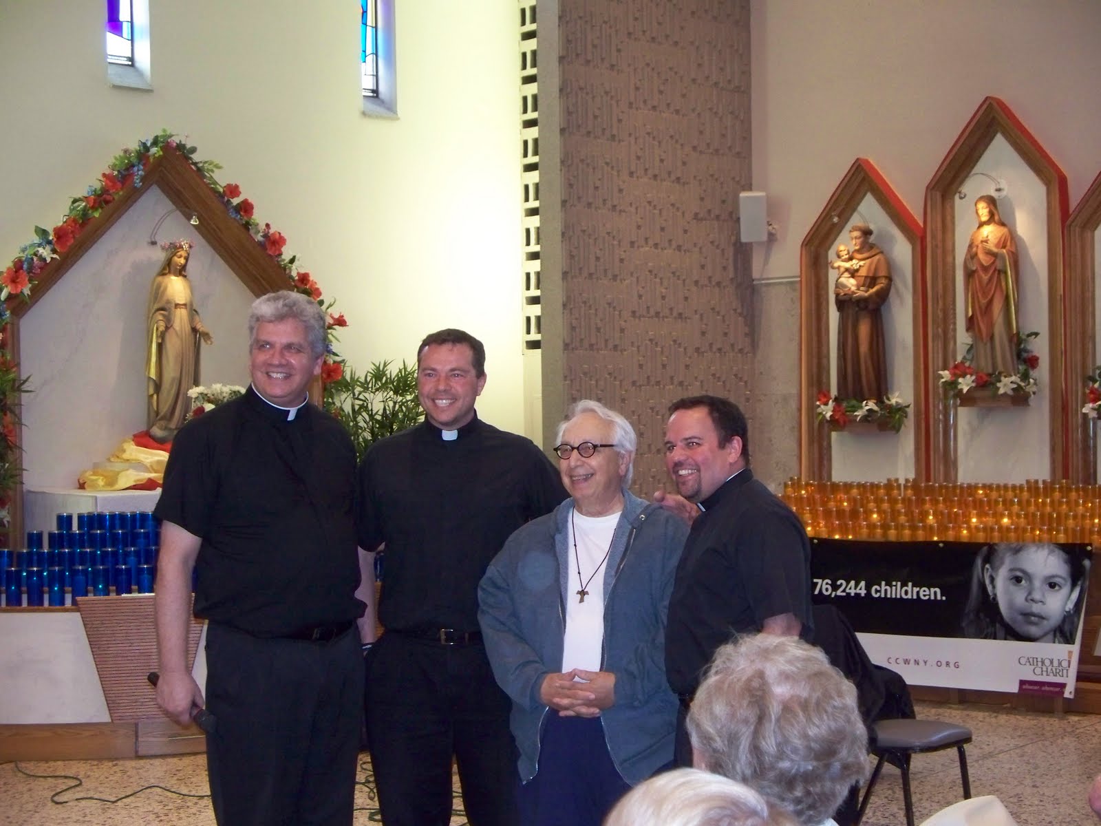 Explore Western New York St. Greg's priests shave heads