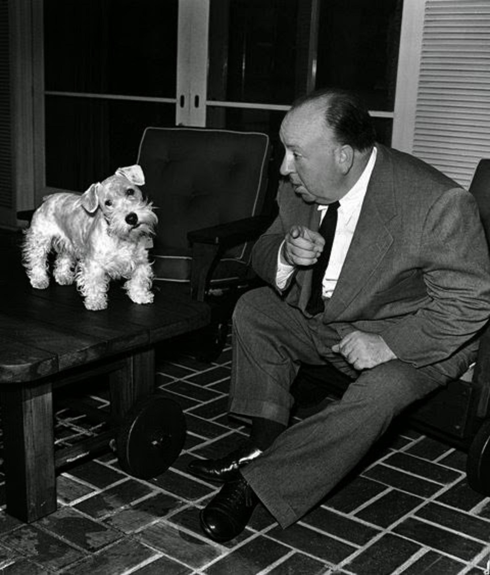 Alfred Hitchcock and dog.