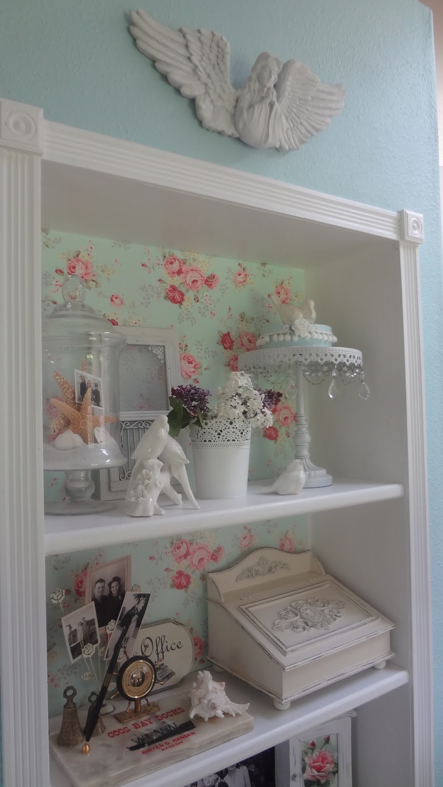 For the love of white Adhering fabric to bookcase