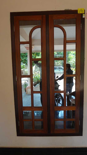 Latest kerala model Wooden Window Door Designs - Wood Design Ideas