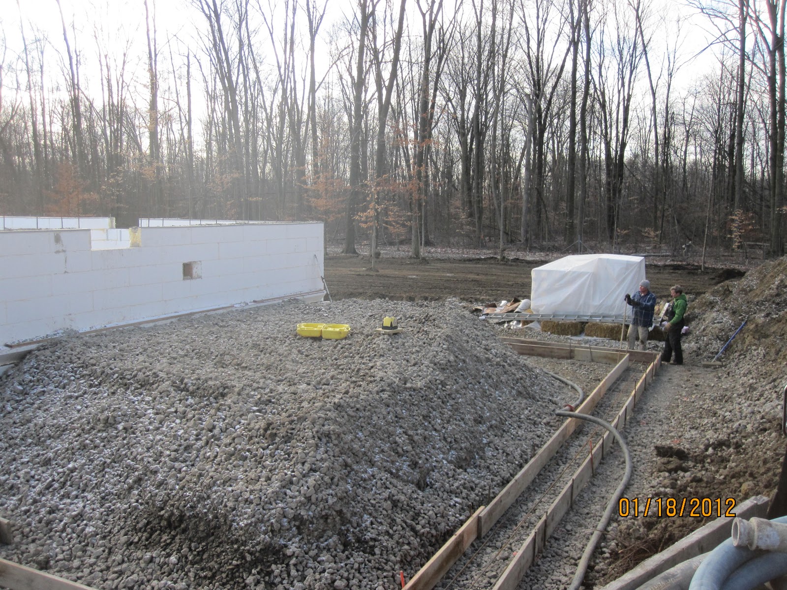 Energy Efficient Building Network Placing Concrete In Garage Footings