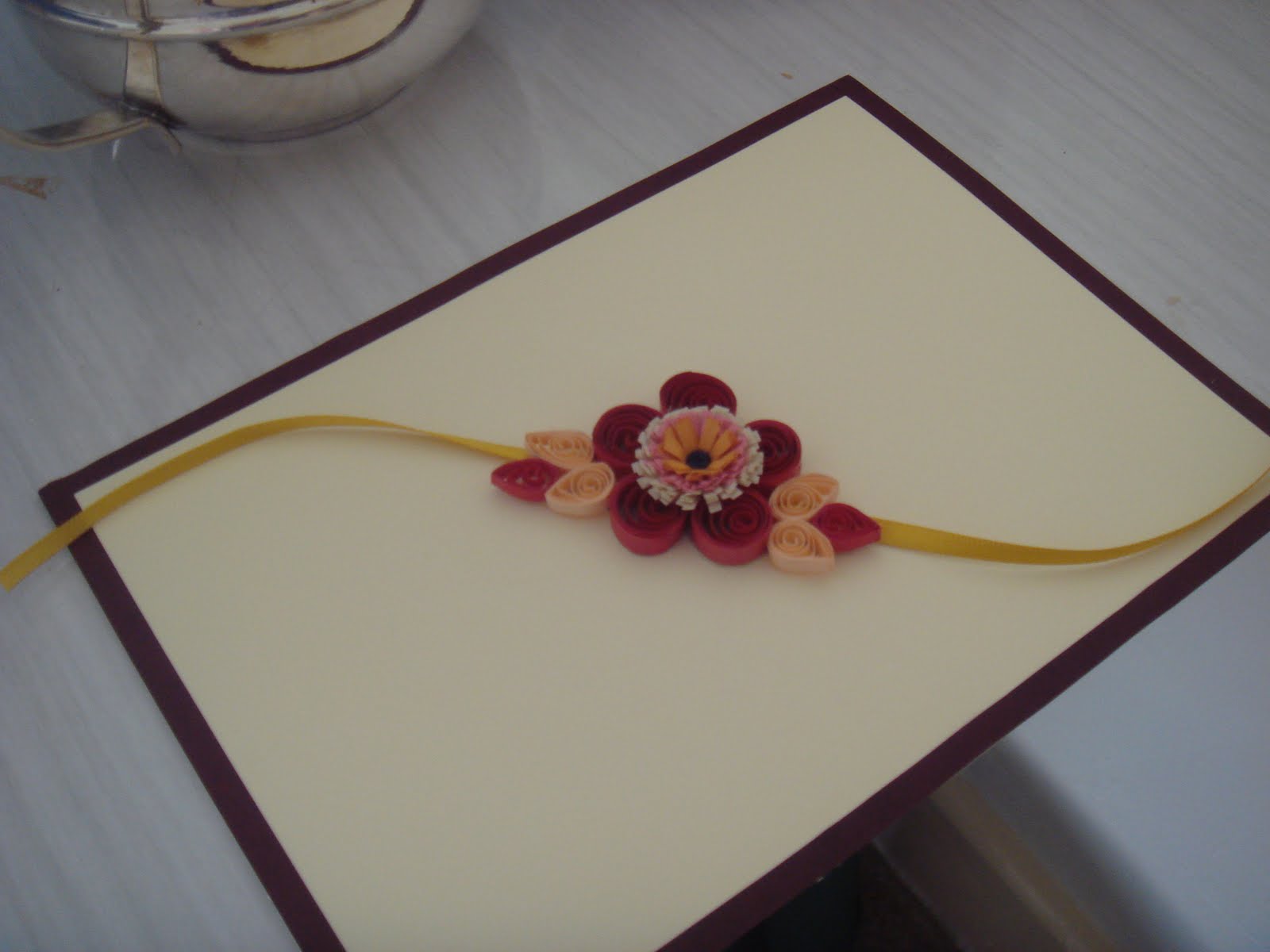 Life's little treasures Quilled Rakhi love you K J