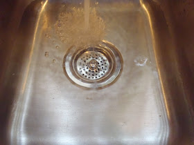 fill sink with hot water