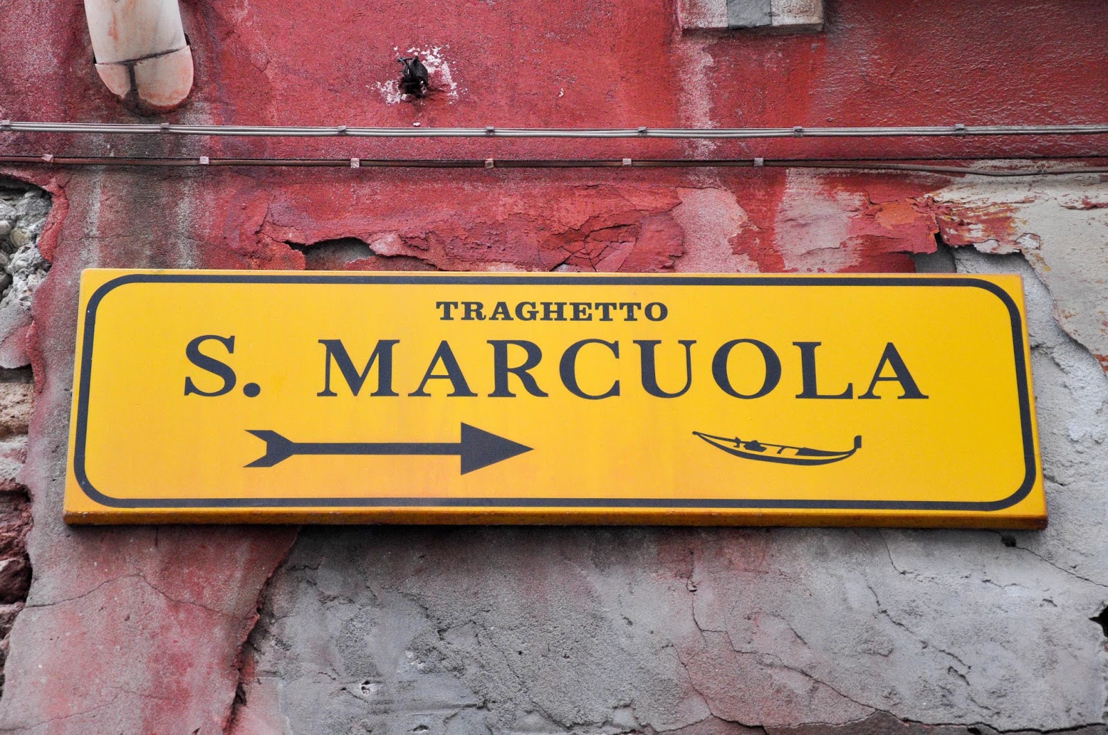 Sign pointing to S. Marcuola traghetto stop, Venice, Italy