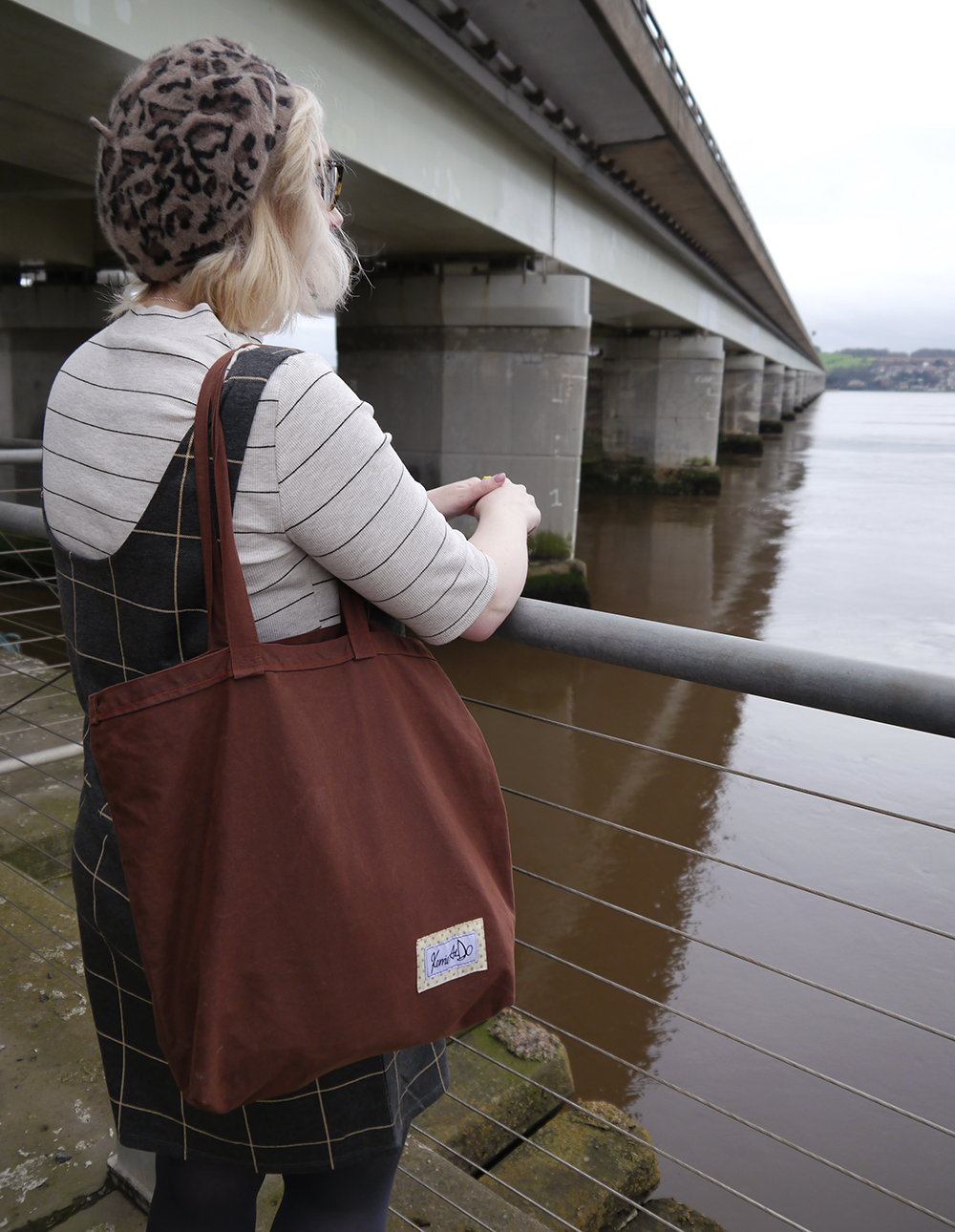Kerrie Aldo bag: location Tay Road Bridge in Dundee IOLLA Muir tortoise shell frames, leopard print beret, kawaii spoon necklace, layering checks, Scottish winter style, Scottish fashion blogger, Kerrie Aldo waxed cotton bag, Tay Road Bridge, Dundee style, what to wear in winter in Scotland, January weather in Scotland