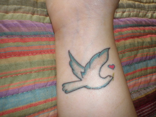 Dove Tattoo A Universal Symbol of Love Peace and Unity