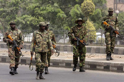 soldiers working with guns parading lagos streets