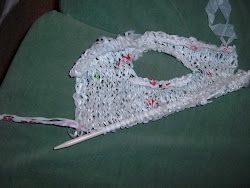 Knitting with 'plarn'.