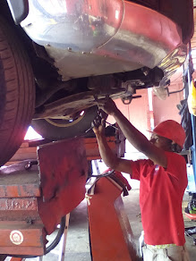 MEECHEAL EXCEL AUTO CARE CENTRE ENGINEERS @ WORK