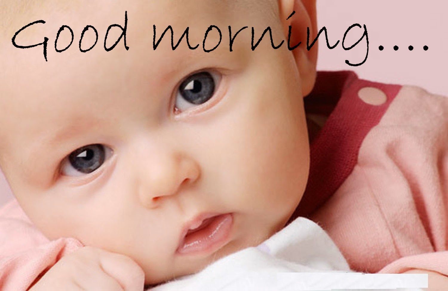 Smilling Child Wishes Good Morning Wallpaper With Message