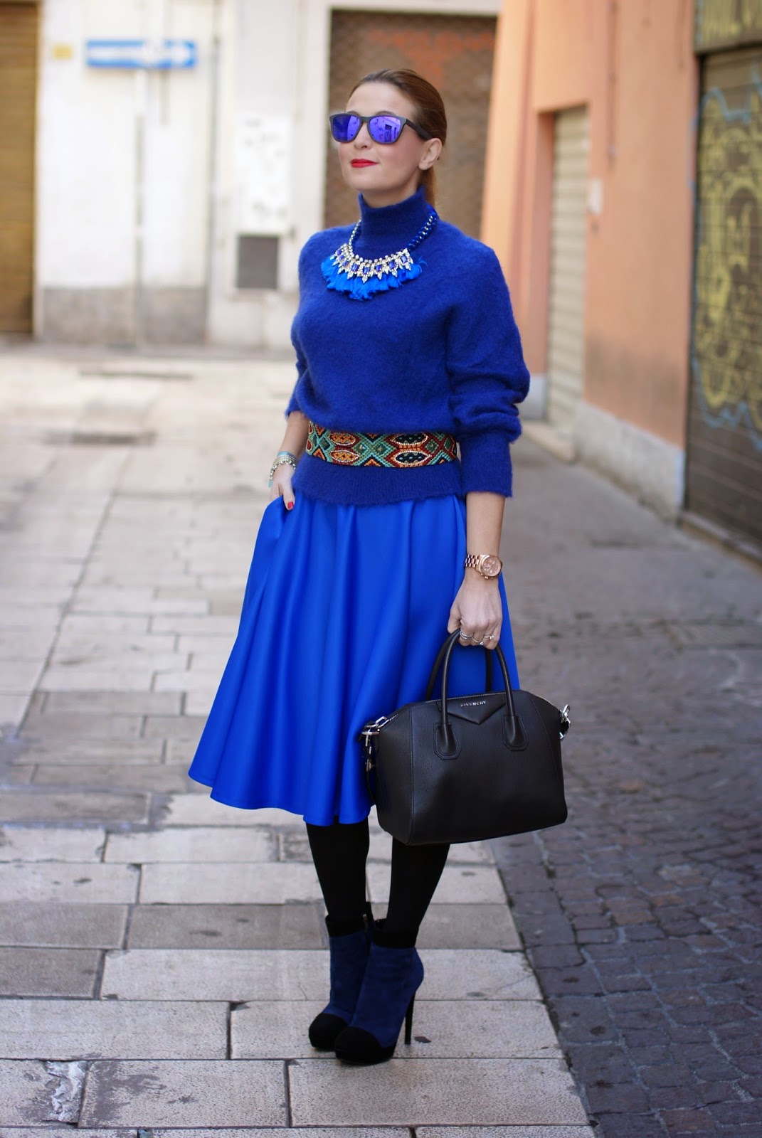cobalt blue midi circle skirt, Givenchy Antigona bag, turtleneck sweater with tassel necklace, Fashion and Cookies, fashion blogger