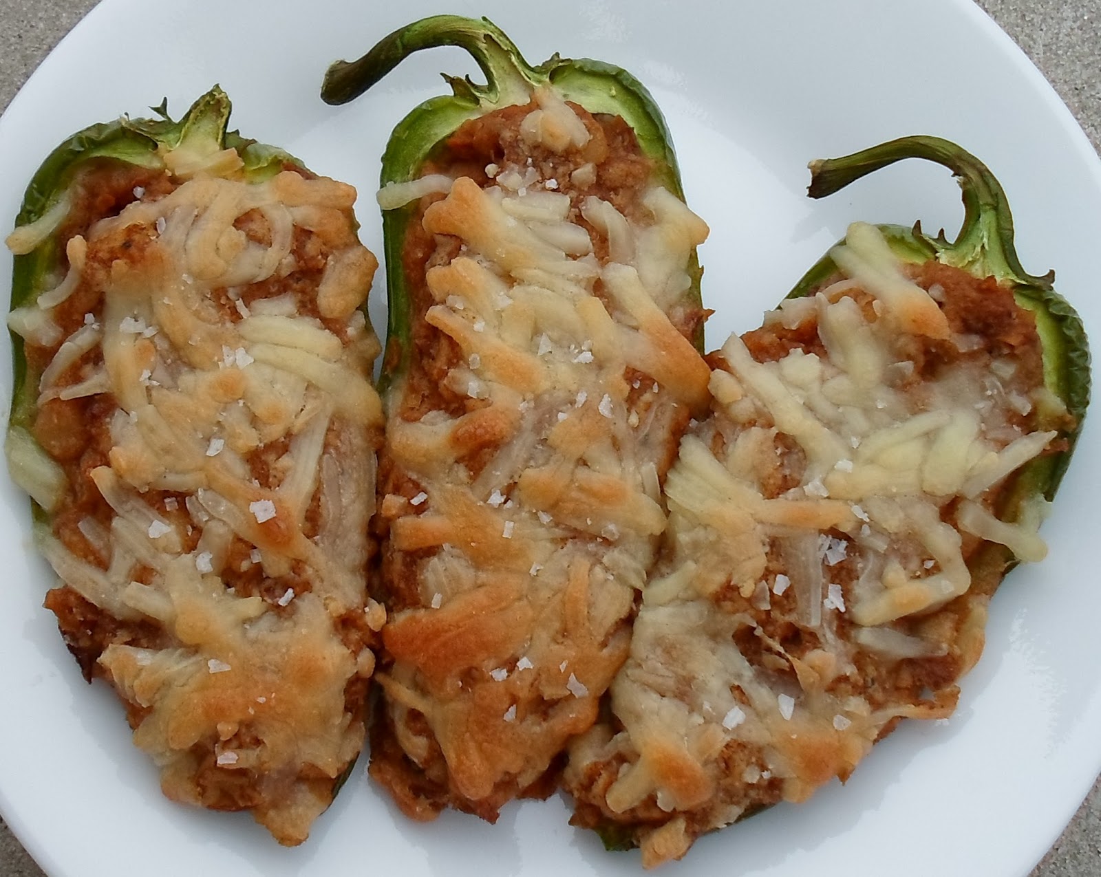 Happier Than A Pig In Mud Refried Bean and Cheddar Stuffed Jalapenos