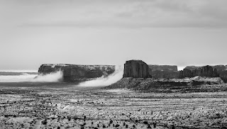 Fog clears from Monument Valley after a mid December snow.