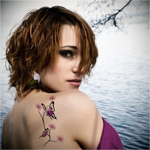 The butterfly tattoo design has never lost its popularity for women