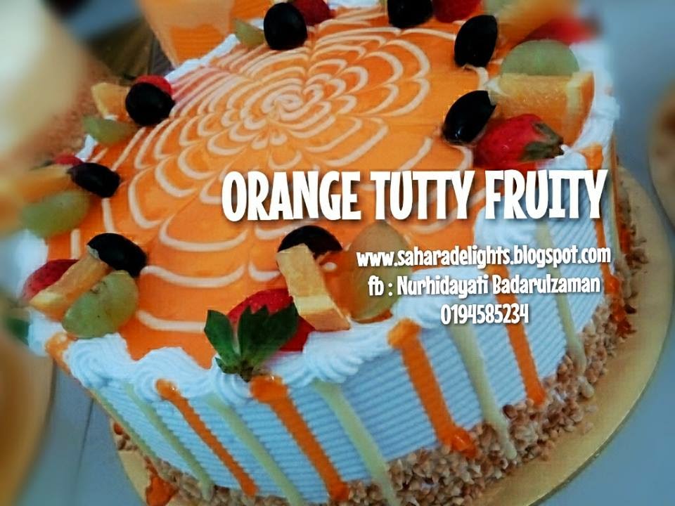 ORANGE TUTTI FRUITTY CAKE