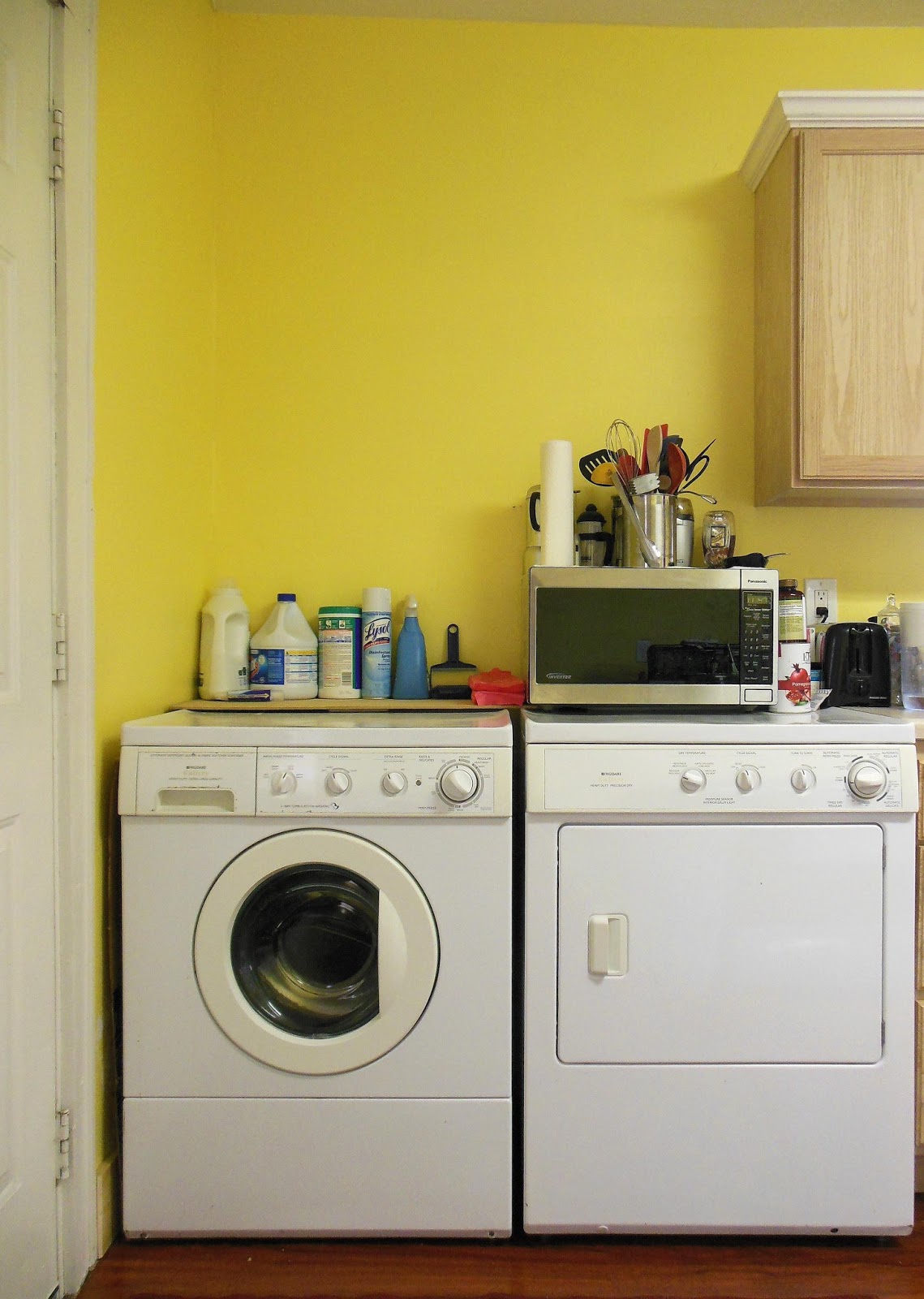 Kitchen With Washer And Dryer