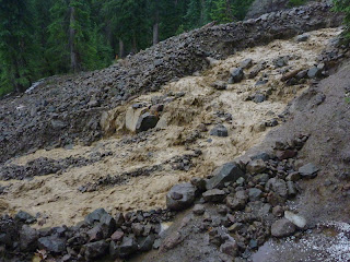 Flow of muddy water over the Pacific Crest Trail during a hail- and thunderstorm on July 21, 2013