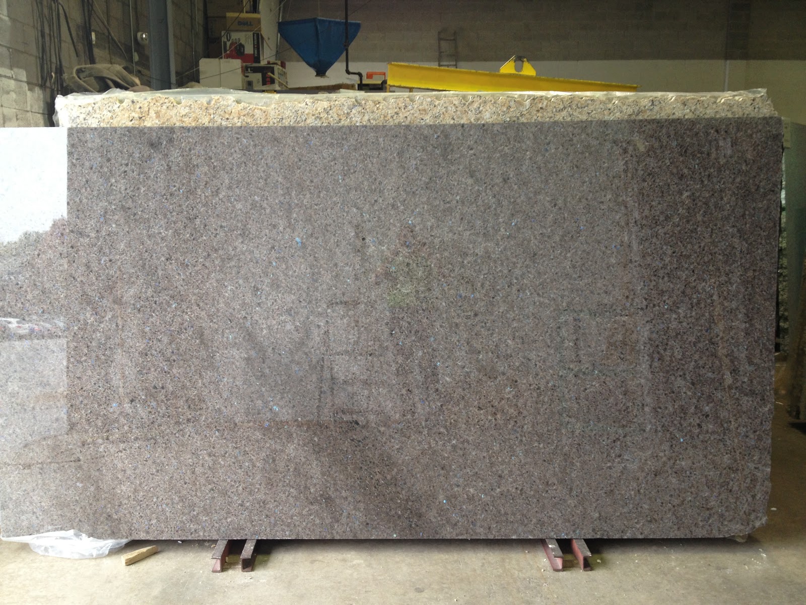 Slab door kitchen cabinets The kitchen countertop slab. Look close and you can see the blue in it