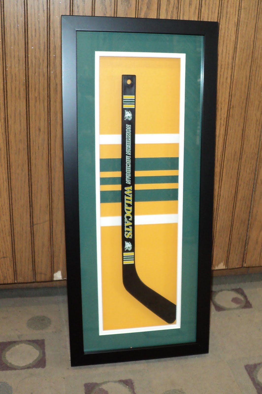 The UP's most creative frame shop Framing NMU hockey jersey