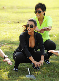 Kim Kardashian stretching
